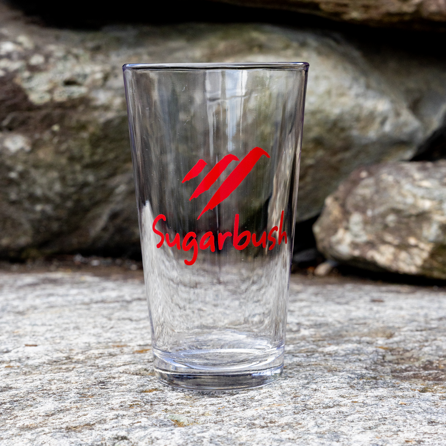 Sugarbush 16 oz. Pint glass with red logo.